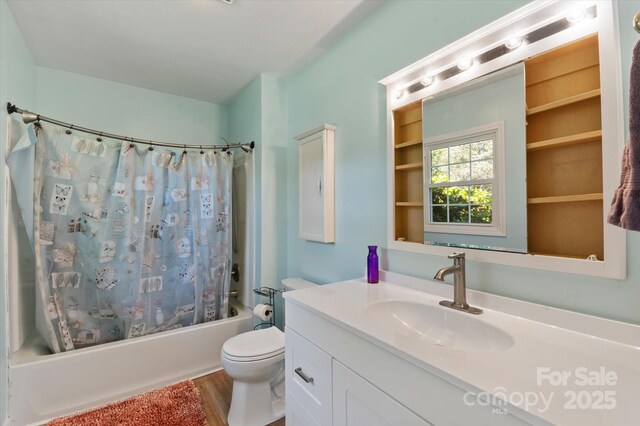 103 Hampshire Ln, Canton, NC 28716 - bathroom featuring shower / bath combo, vanity, toilet, and wood finished floors
