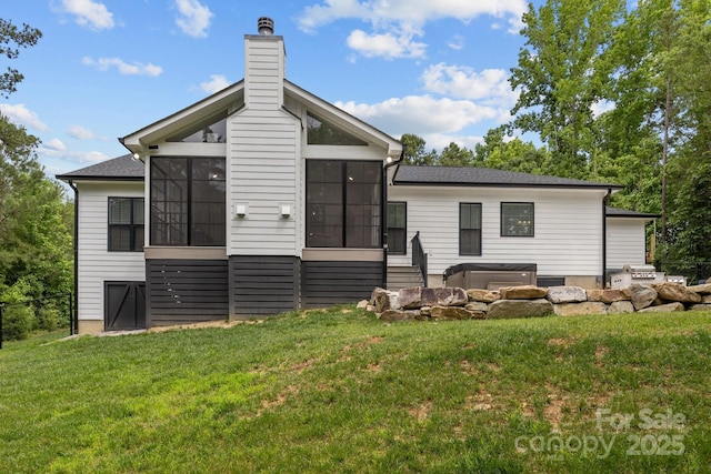 2577 Bonnybrook Cir, Rock Hill, SC 29732 - back of property featuring a sunroom, a yard, and a chimney