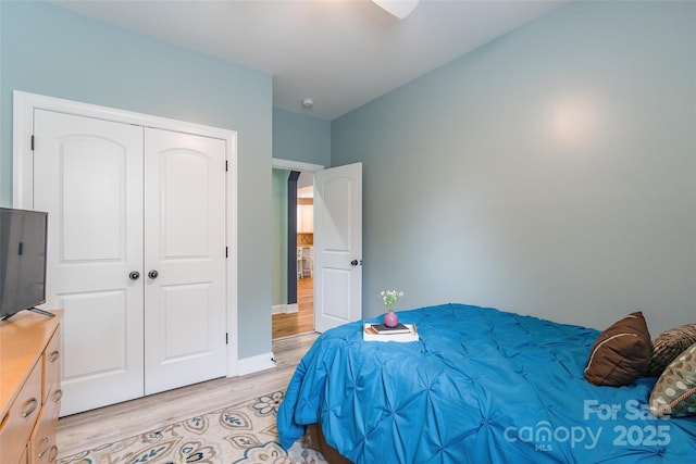 85017 Newloch Ct, Lancaster, SC 29720 - bedroom with light wood-type flooring, a closet, and baseboards