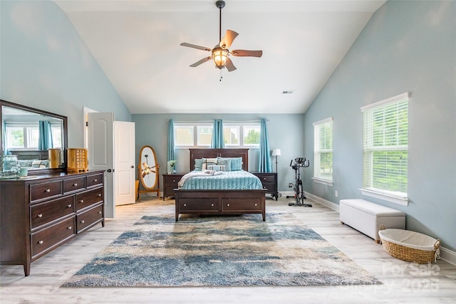 85017 Newloch Ct, Lancaster, SC 29720 - bedroom featuring light wood finished floors, high vaulted ceiling, baseboards, and ceiling fan