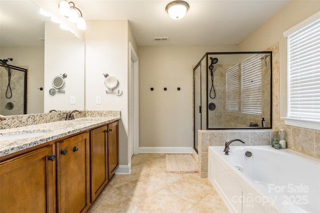 85017 Newloch Ct, Lancaster, SC 29720 - bathroom featuring a stall shower, a bath, double vanity, and tile patterned floors