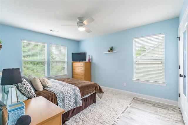 85017 Newloch Ct, Lancaster, SC 29720 - bedroom with wood finished floors, baseboards, and a ceiling fan