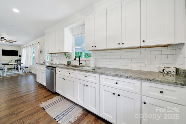 2248 White Heron Rd, Liberty Hill, SC 29074 - kitchen featuring a sink, dishwasher, white cabinets, dark wood-style flooring, and tasteful backsplash