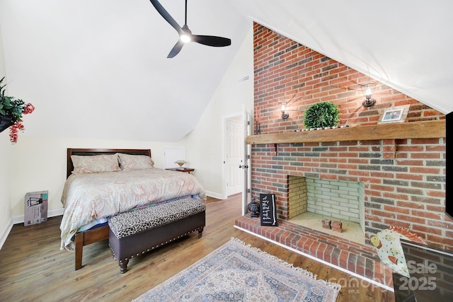 2248 White Heron Rd, Liberty Hill, SC 29074 - bedroom featuring lofted ceiling, baseboards, wood finished floors, and a ceiling fan