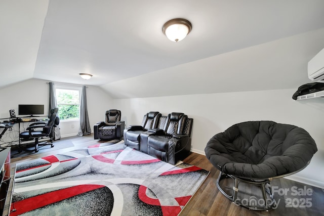2248 White Heron Rd, Liberty Hill, SC 29074 - bedroom with lofted ceiling, a desk, wood finished floors, and baseboards