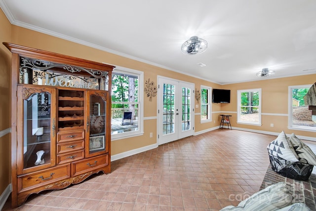 2248 White Heron Rd, Liberty Hill, SC 29074 - living room featuring baseboards, french doors, plenty of natural light, and crown molding