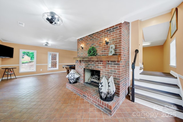 2248 White Heron Rd, Liberty Hill, SC 29074 - living room featuring a fireplace, baseboards, stairway, and tile patterned floors