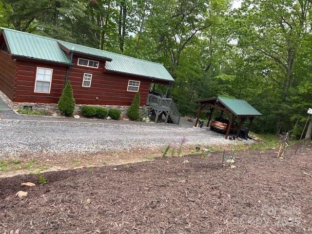 623 Overlook Dr, Spruce Pine, NC 28777 - view of home's exterior featuring stairs and metal roof