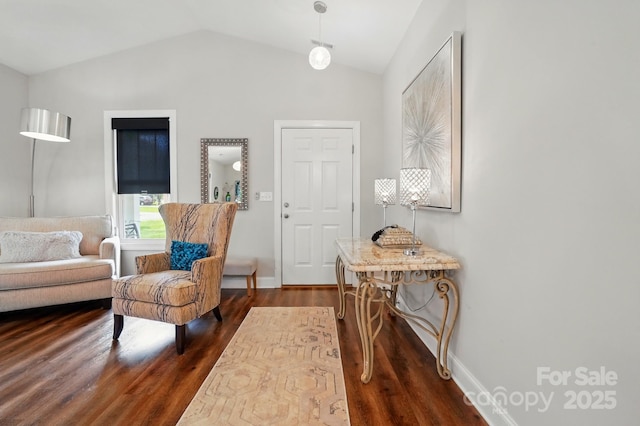 204 Craig St, Mount Holly, NC 28120 - foyer entrance with dark wood finished floors, lofted ceiling, and baseboards