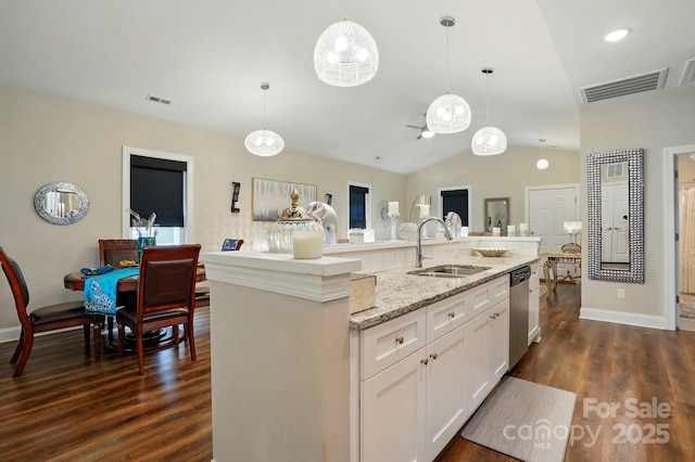 204 Craig St, Mount Holly, NC 28120 - kitchen featuring a sink, vaulted ceiling, stainless steel dishwasher, dark wood finished floors, and an island with sink