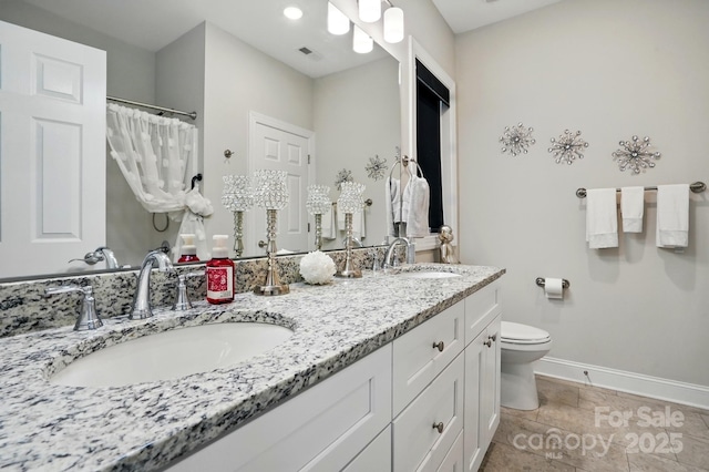 204 Craig St, Mount Holly, NC 28120 - full bathroom featuring baseboards, toilet, double vanity, and a shower with shower curtain
