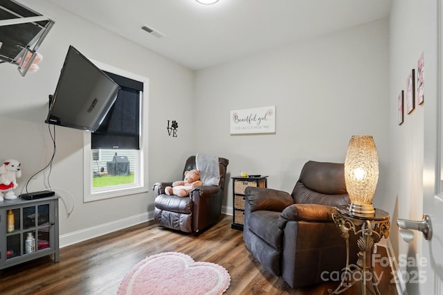 204 Craig St, Mount Holly, NC 28120 - living area featuring wood finished floors and baseboards