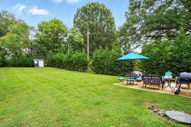 204 Craig St, Mount Holly, NC 28120 - view of grassy yard with a patio and an outdoor hangout area