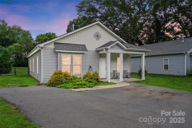 204 Craig St, Mount Holly, NC 28120 - view of front of house with covered porch and board and batten siding