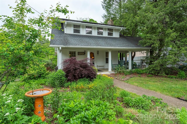 108 Connally St, Black Mountain, NC 28711 - view of front facade featuring a chimney, a porch, and roof with shingles