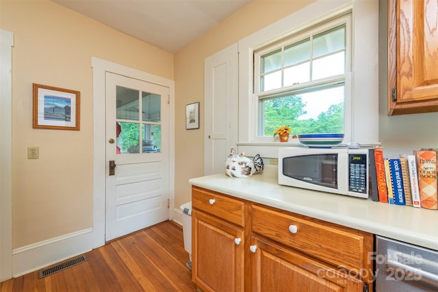 108 Connally St, Black Mountain, NC 28711 - doorway to outside featuring wood finished floors and baseboards