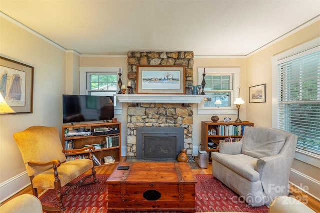 108 Connally St, Black Mountain, NC 28711 - living room featuring wood finished floors, a fireplace, and ornamental molding