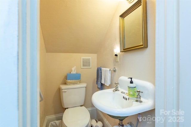 108 Connally St, Black Mountain, NC 28711 - half bathroom with lofted ceiling and a sink