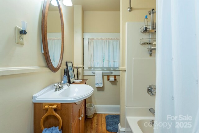 108 Connally St, Black Mountain, NC 28711 - full bath with vanity, wood finished floors, and shower / tub combo