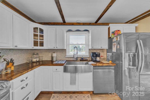 1 Plaza Dr, Granite Falls, NC 28630 - kitchen featuring appliances with stainless steel finishes, a sink, backsplash, glass insert cabinets, and white cabinets
