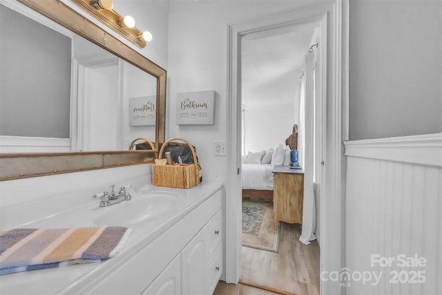 1 Plaza Dr, Granite Falls, NC 28630 - bathroom with vanity, connected bathroom, and wood finished floors
