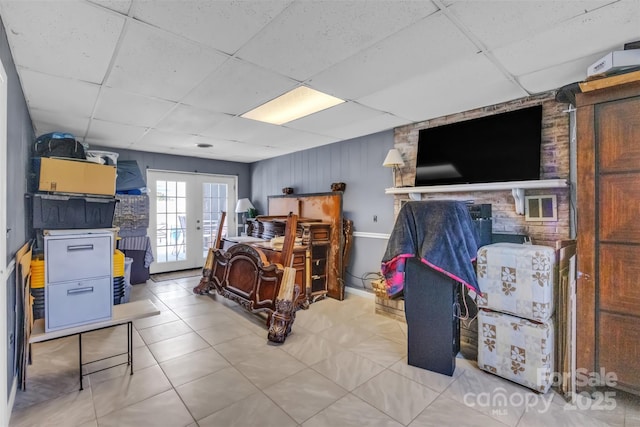 1 Plaza Dr, Granite Falls, NC 28630 - tiled bedroom featuring a paneled ceiling, french doors, access to exterior, and baseboards