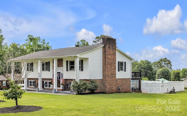 1 Plaza Dr, Granite Falls, NC 28630 - raised ranch featuring a chimney and brick siding