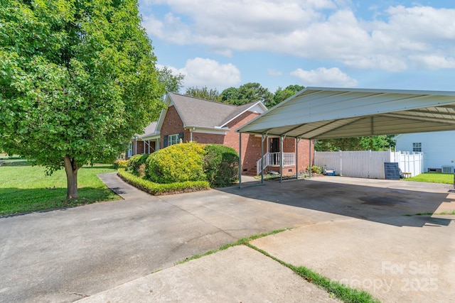 500 Belleview Rd, Rock Hill, SC 29730 - view of front of property featuring brick siding, driveway, and a detached carport