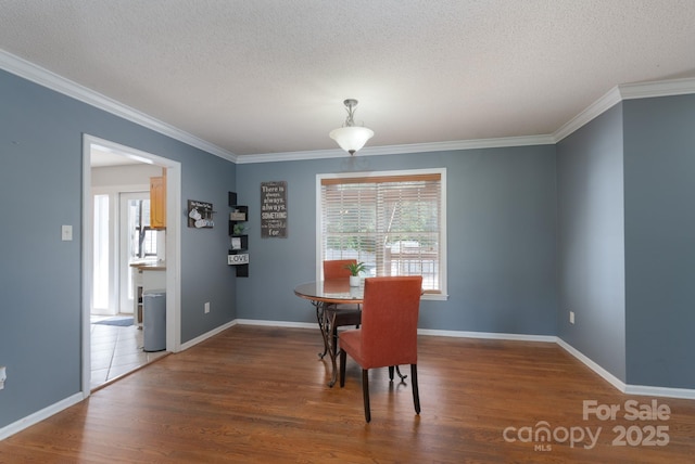 500 Belleview Rd, Rock Hill, SC 29730 - dining space featuring healthy amount of natural light, crown molding, wood finished floors, a textured ceiling, and baseboards