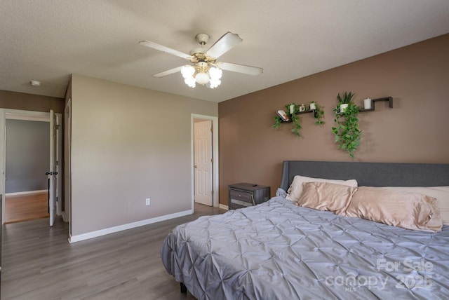 500 Belleview Rd, Rock Hill, SC 29730 - bedroom with wood finished floors, baseboards, and a ceiling fan
