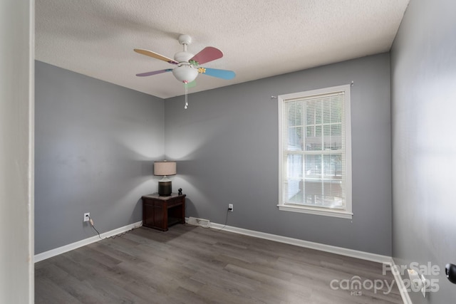 500 Belleview Rd, Rock Hill, SC 29730 - spare room featuring a ceiling fan, wood finished floors, a textured ceiling, and baseboards