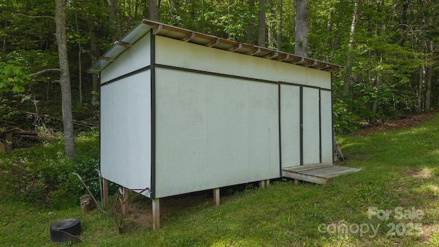 559 Mouth Of Silas Creek Rd, Lansing, NC 28643 - view of shed with a forest view
