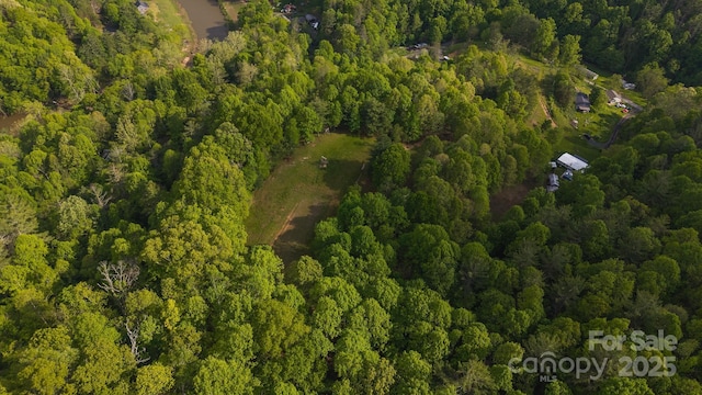 559 Mouth Of Silas Creek Rd, Lansing, NC 28643 - aerial overview of property's location featuring a heavily wooded area