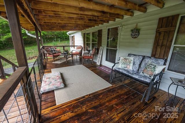 559 Mouth Of Silas Creek Rd, Lansing, NC 28643 - wooden deck featuring an outdoor living space