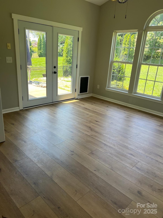 2567 Holly Oak Ln, Gastonia, NC 28056 - unfurnished living room featuring french doors and hardwood / wood-style flooring