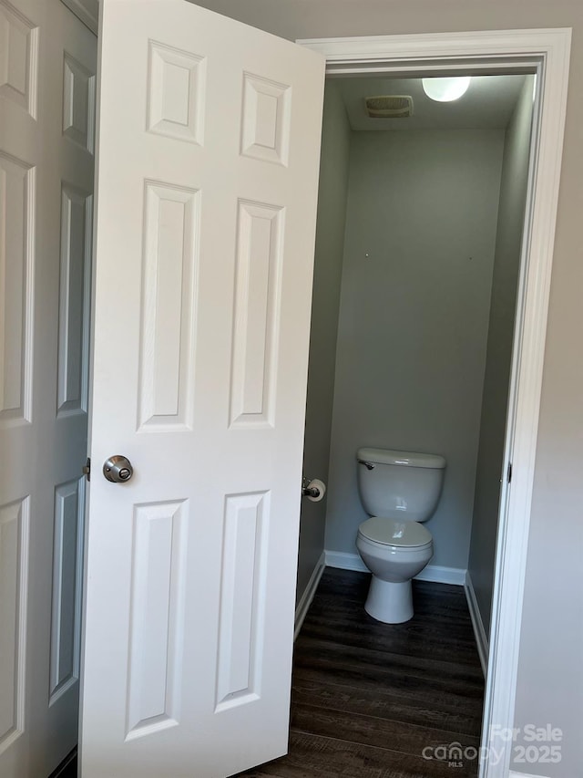 2567 Holly Oak Ln, Gastonia, NC 28056 - bathroom featuring baseboards and wood finished floors