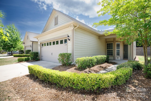 238 Cherrytree Dr, Fort Mill, SC 29715 - view of side of home with concrete driveway and a garage