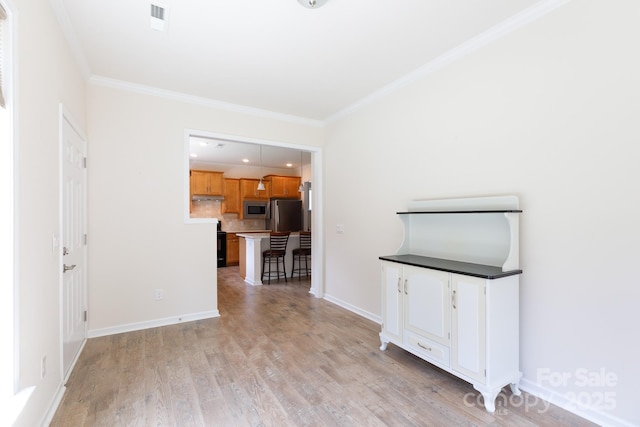 238 Cherrytree Dr, Fort Mill, SC 29715 - unfurnished living room with crown molding, light wood-style flooring, and baseboards
