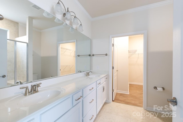 238 Cherrytree Dr, Fort Mill, SC 29715 - full bathroom with toilet, a walk in closet, double vanity, ornamental molding, and a shower stall