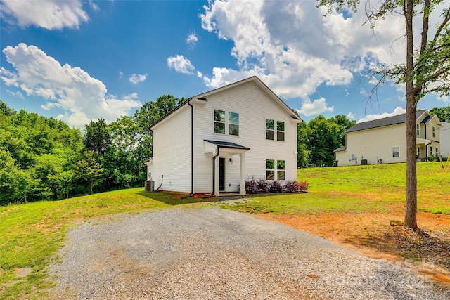 415 Kickapoo Ave, Gastonia, NC 28056 - view of front facade with central air condition unit and a front yard