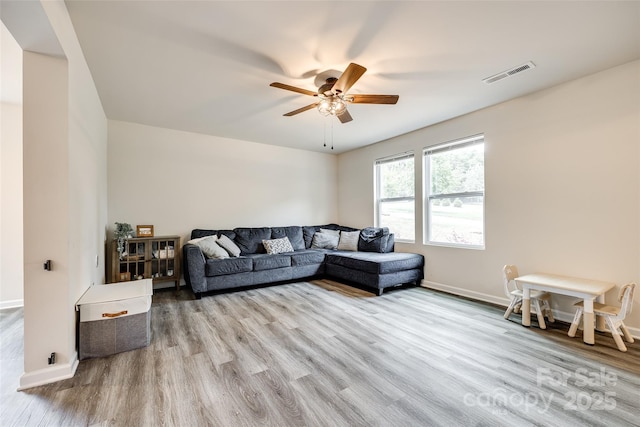 415 Kickapoo Ave, Gastonia, NC 28056 - living room with a ceiling fan, wood finished floors, and baseboards