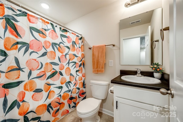 415 Kickapoo Ave, Gastonia, NC 28056 - bathroom featuring vanity, toilet, tile patterned floors, baseboards, and curtained shower