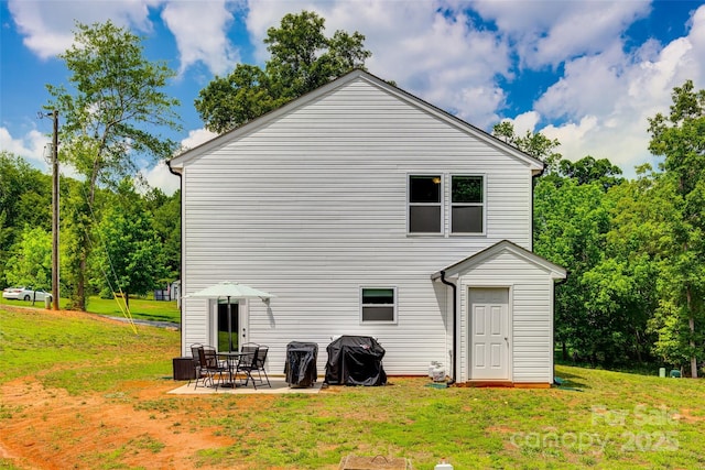 415 Kickapoo Ave, Gastonia, NC 28056 - back of house with a yard and a patio