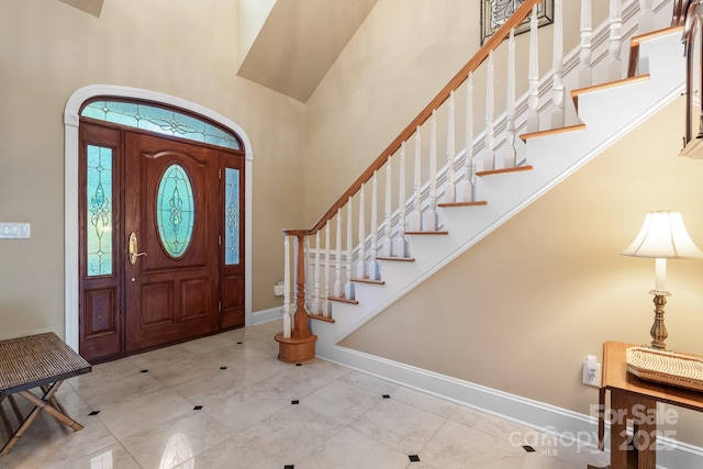 5487 Back Shore Dr, Granite Falls, NC 28630 - entrance foyer featuring a towering ceiling, stairs, and baseboards