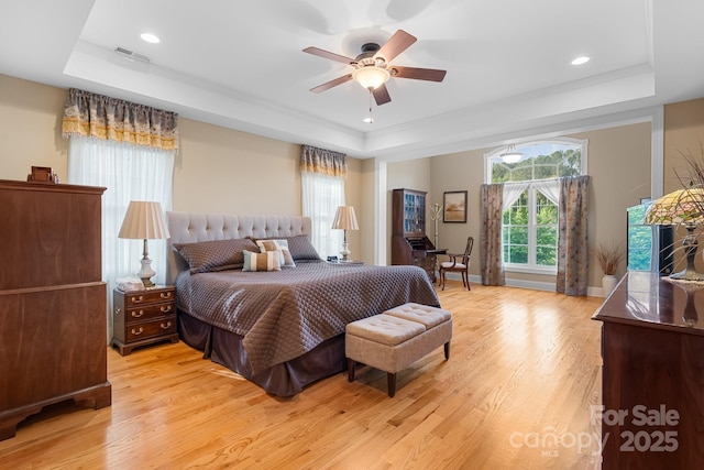 5487 Back Shore Dr, Granite Falls, NC 28630 - bedroom with a raised ceiling, light wood-type flooring, and recessed lighting