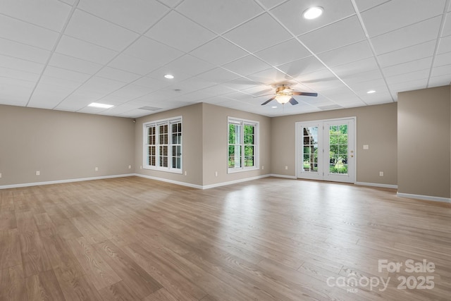 5487 Back Shore Dr, Granite Falls, NC 28630 - empty room featuring light wood-style floors, baseboards, a paneled ceiling, ceiling fan, and recessed lighting