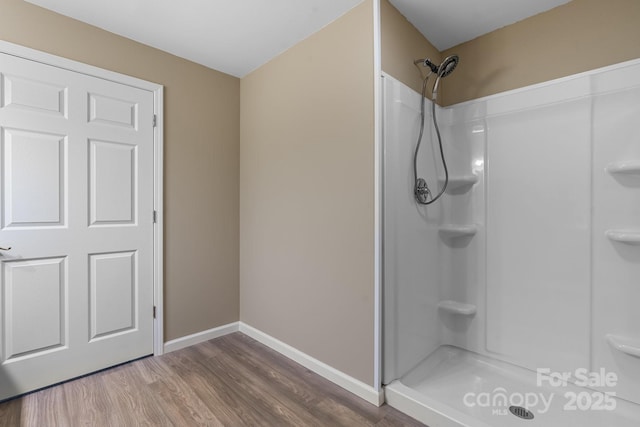 5487 Back Shore Dr, Granite Falls, NC 28630 - full bath featuring walk in shower, wood finished floors, and baseboards
