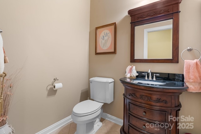 5487 Back Shore Dr, Granite Falls, NC 28630 - half bathroom with toilet, tile patterned floors, vanity, and baseboards
