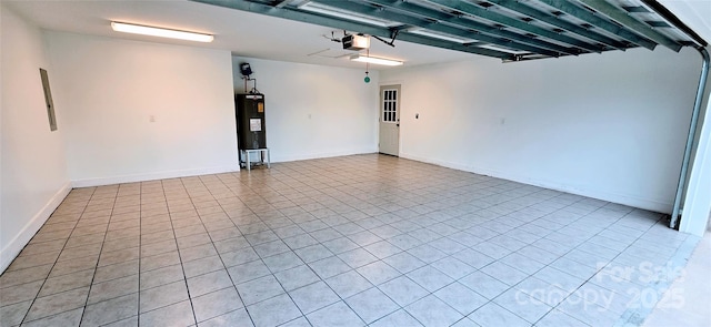 120 Deer Ridge Dr, Hudson, NC 28638 - garage featuring water heater and baseboards