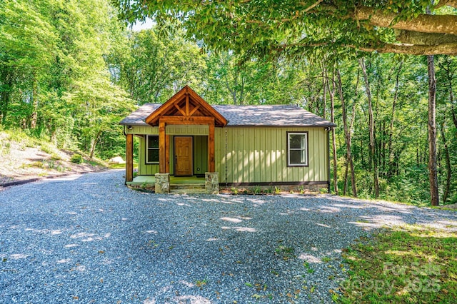2448 Alfred Hartley Rd, Lenoir, NC 28645 - chalet / cabin with board and batten siding and a shingled roof